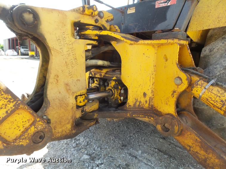 image for item DC7261 1990 John Deere 710C backhoe