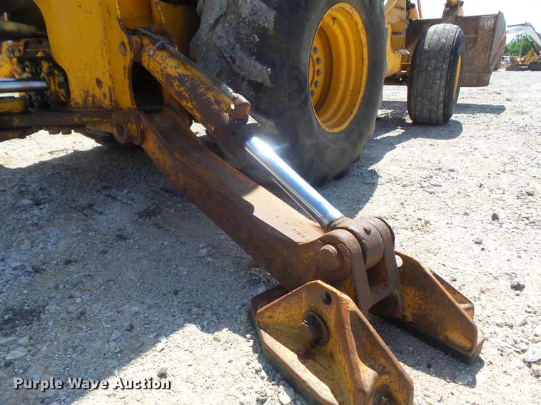 image for item DC7261 1990 John Deere 710C backhoe
