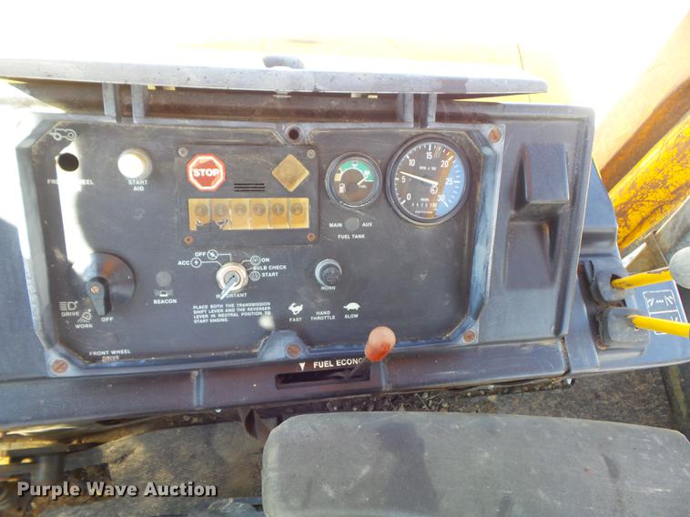 image for item DC7261 1990 John Deere 710C backhoe