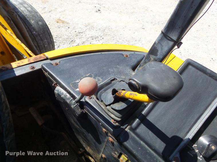 image for item DC7261 1990 John Deere 710C backhoe