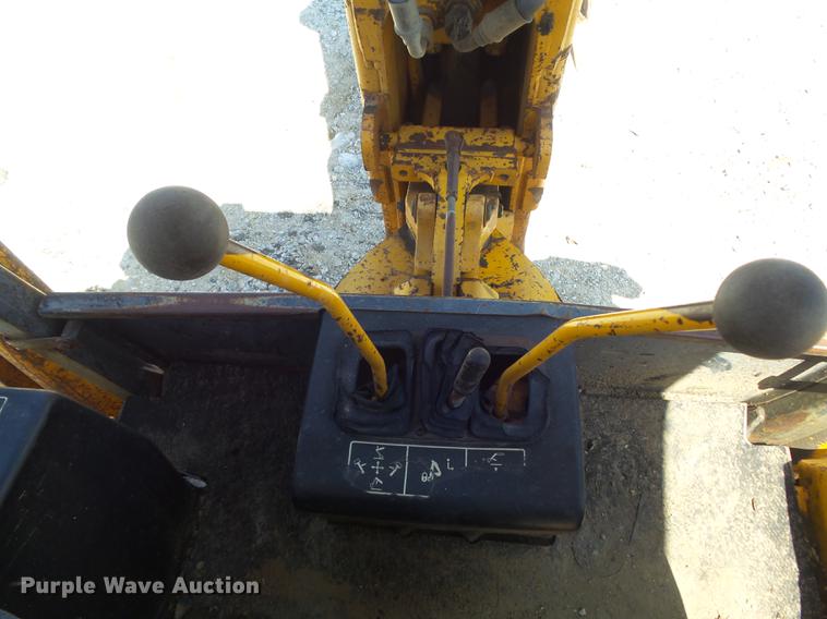 image for item DC7261 1990 John Deere 710C backhoe