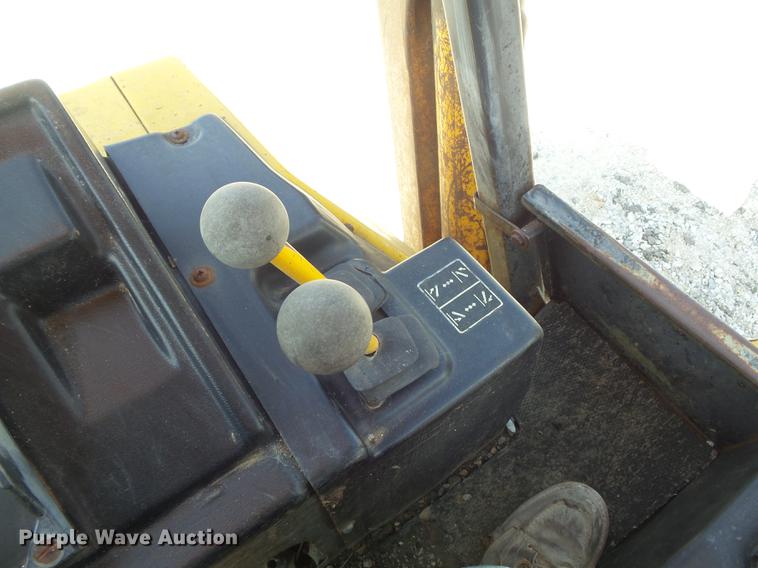 image for item DC7261 1990 John Deere 710C backhoe