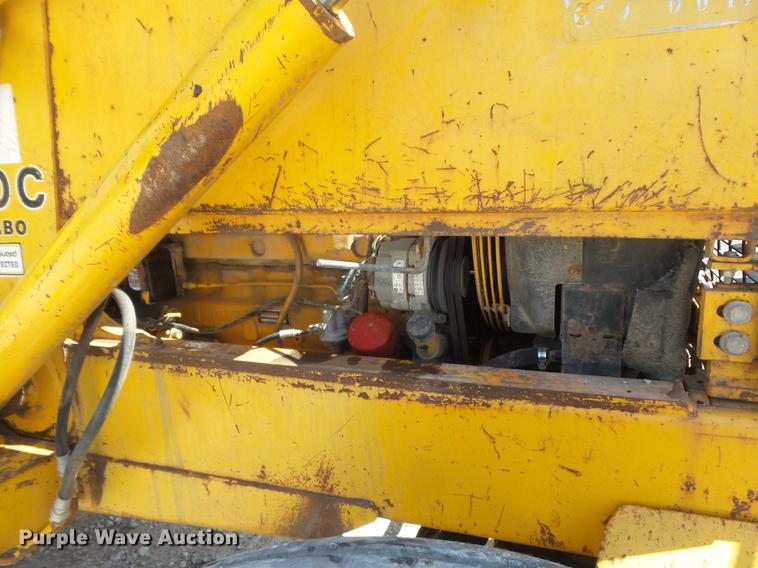 image for item DC7261 1990 John Deere 710C backhoe