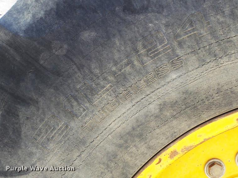 image for item DC7261 1990 John Deere 710C backhoe