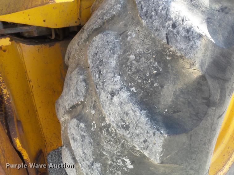 image for item DC7261 1990 John Deere 710C backhoe