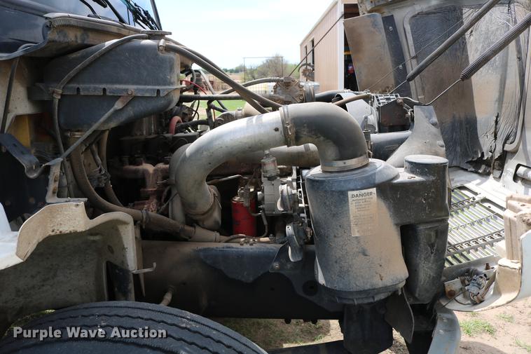 image for item DC7567 1994 Freightliner FL70 winch truck