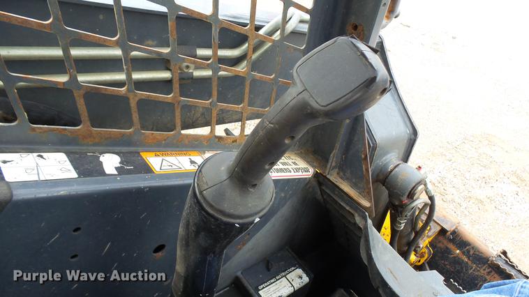 image for item DP9527 2011 John Deere 323D skid steer