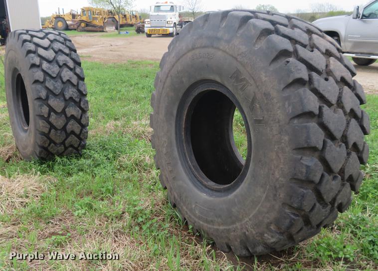 image for item EJ9574 (2) Titan MXL 23.5R25 tires