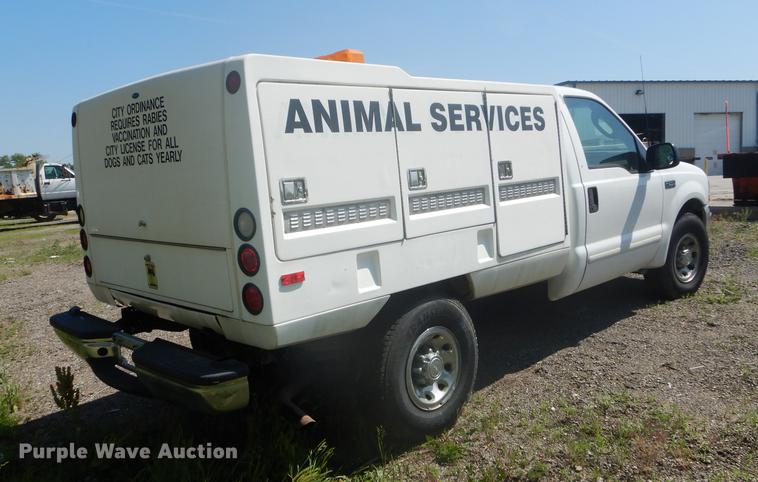 image for item DB6102 2003 Ford F250 Super Duty XLT utility bed pickup truck