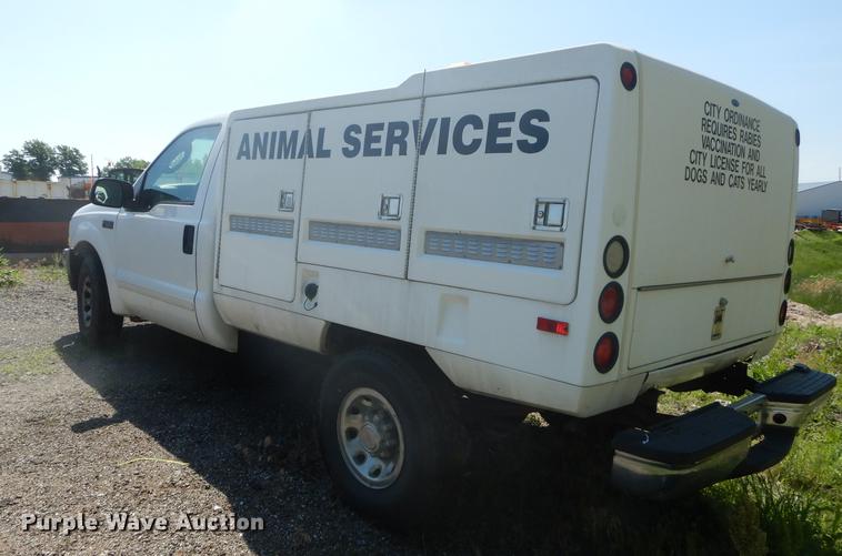 image for item DB6102 2003 Ford F250 Super Duty XLT utility bed pickup truck