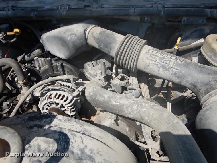 image for item DB6102 2003 Ford F250 Super Duty XLT utility bed pickup truck