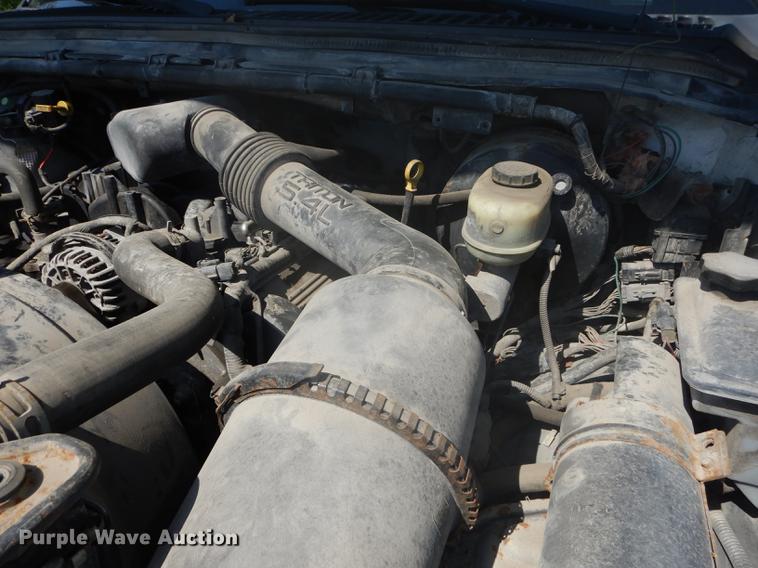 image for item DB6102 2003 Ford F250 Super Duty XLT utility bed pickup truck