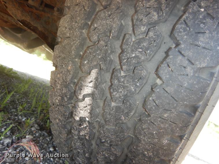 image for item DB6102 2003 Ford F250 Super Duty XLT utility bed pickup truck