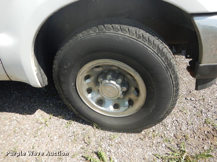 image for item DB6102 2003 Ford F250 Super Duty XLT utility bed pickup truck