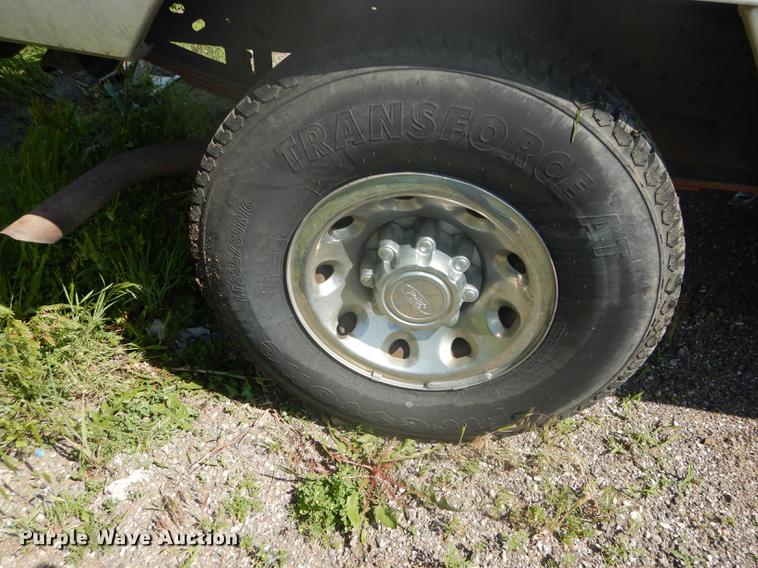 image for item DB6102 2003 Ford F250 Super Duty XLT utility bed pickup truck