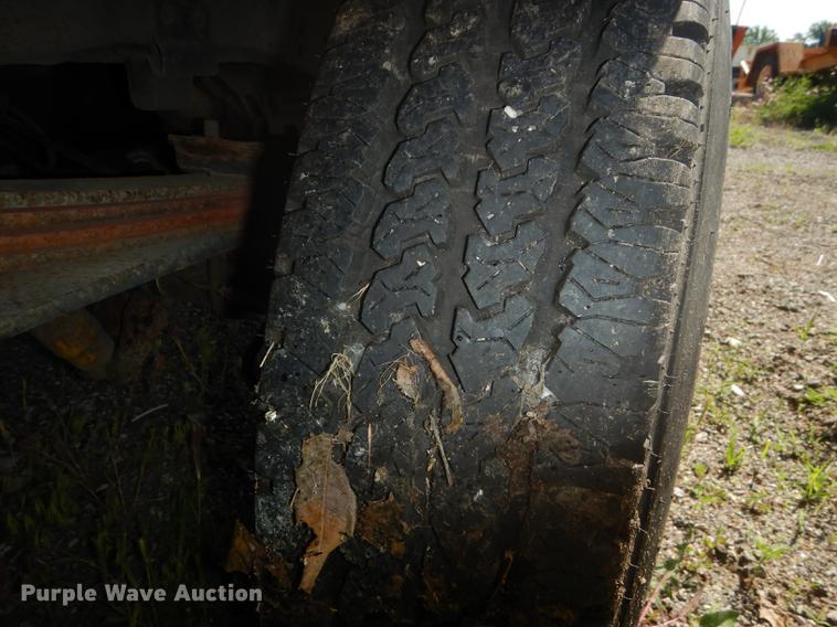 image for item DB6102 2003 Ford F250 Super Duty XLT utility bed pickup truck