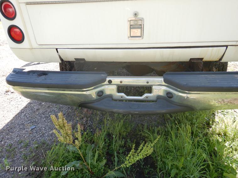 image for item DB6102 2003 Ford F250 Super Duty XLT utility bed pickup truck