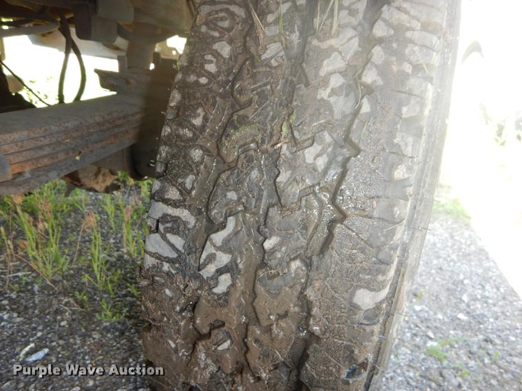 image for item DB6102 2003 Ford F250 Super Duty XLT utility bed pickup truck