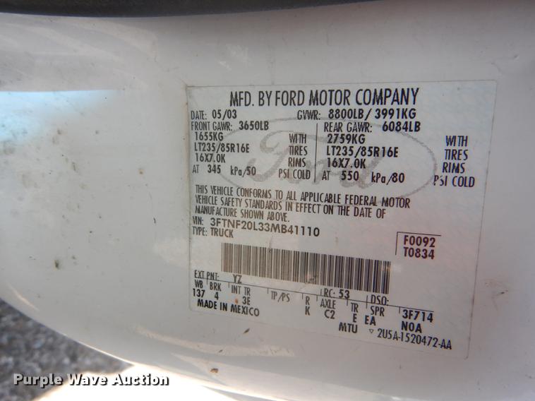 image for item DB6102 2003 Ford F250 Super Duty XLT utility bed pickup truck