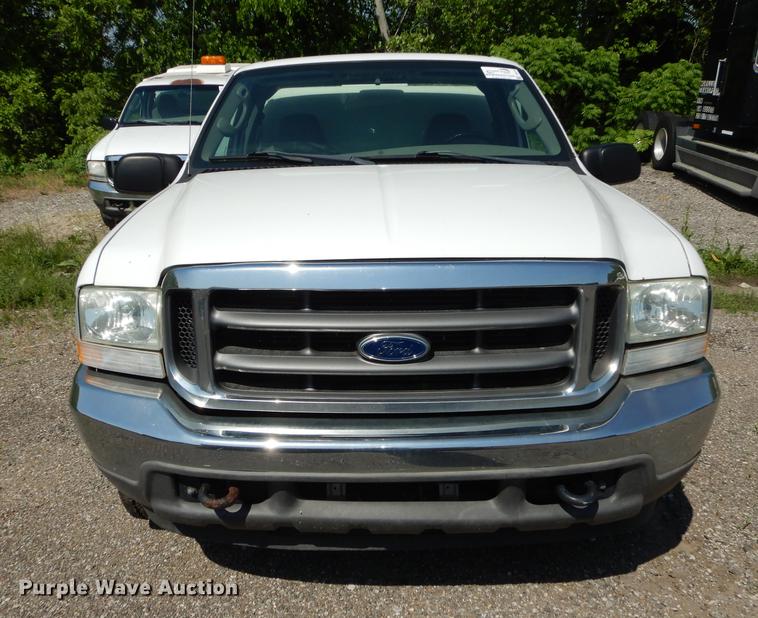 image for item DB6103 2004 Ford F250 Super Duty XLT utility bed pickup truck