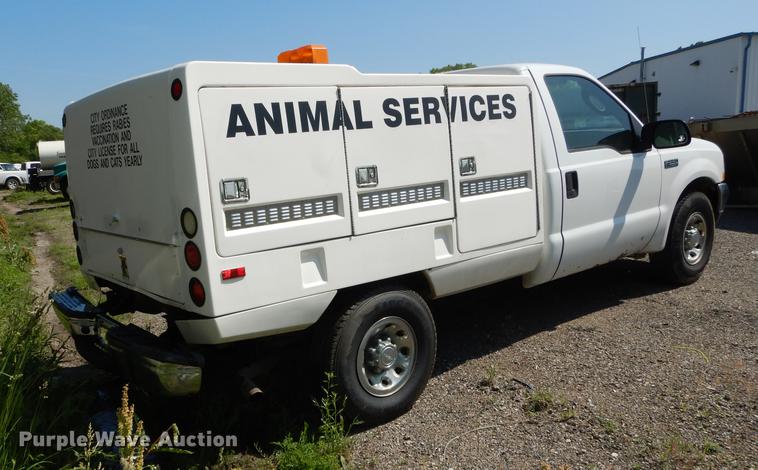 image for item DB6103 2004 Ford F250 Super Duty XLT utility bed pickup truck