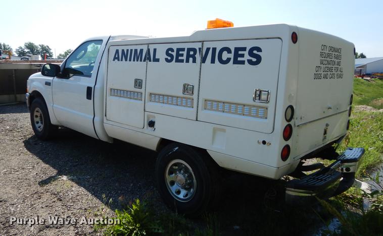 image for item DB6103 2004 Ford F250 Super Duty XLT utility bed pickup truck