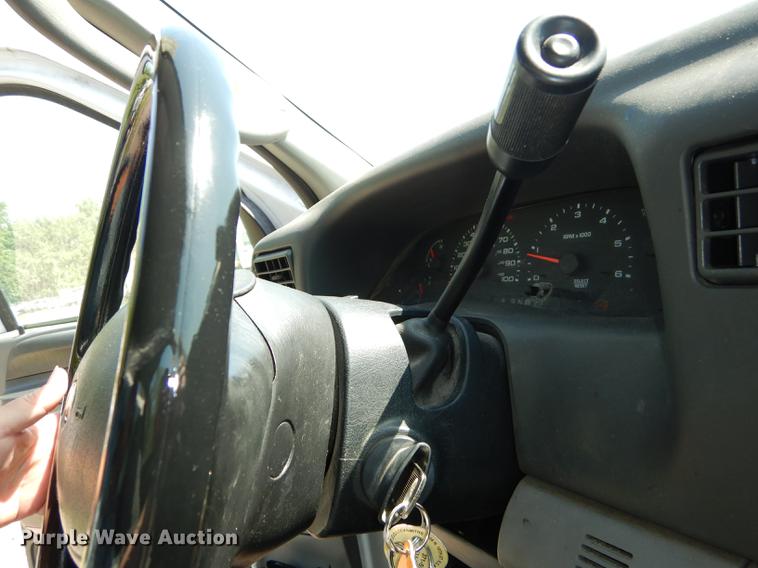 image for item DB6103 2004 Ford F250 Super Duty XLT utility bed pickup truck