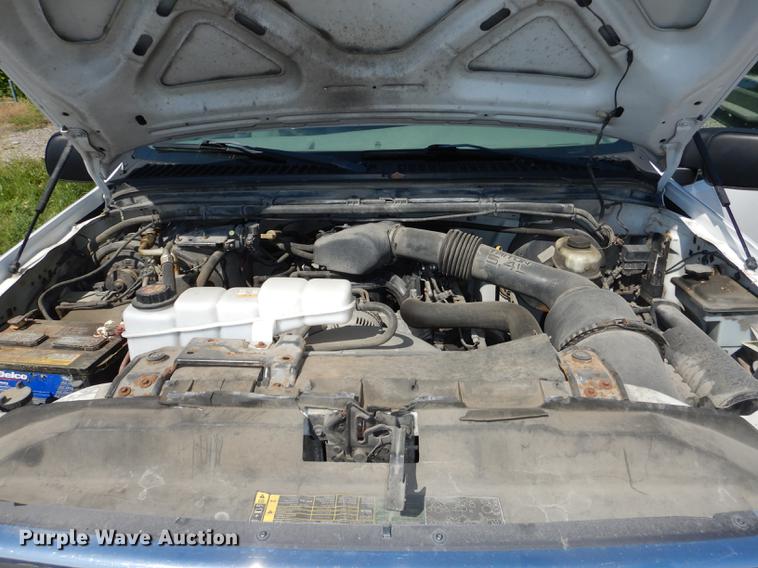 image for item DB6103 2004 Ford F250 Super Duty XLT utility bed pickup truck