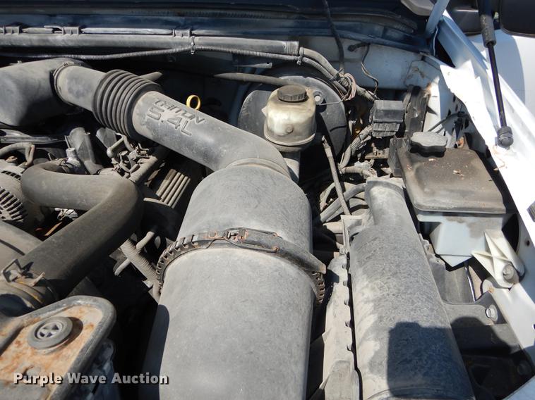 image for item DB6103 2004 Ford F250 Super Duty XLT utility bed pickup truck