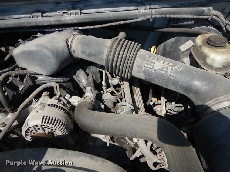 image for item DB6103 2004 Ford F250 Super Duty XLT utility bed pickup truck