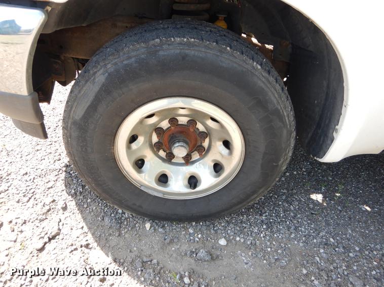 image for item DB6103 2004 Ford F250 Super Duty XLT utility bed pickup truck