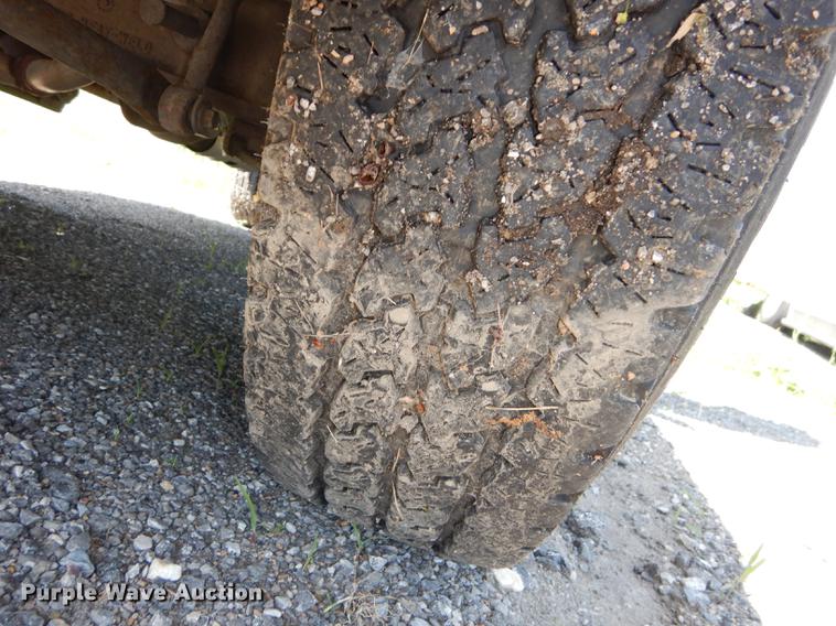 image for item DB6103 2004 Ford F250 Super Duty XLT utility bed pickup truck