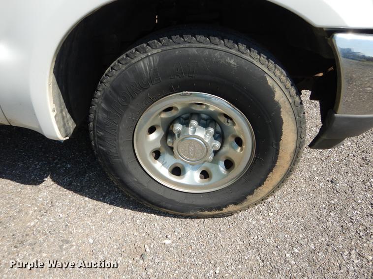 image for item DB6103 2004 Ford F250 Super Duty XLT utility bed pickup truck