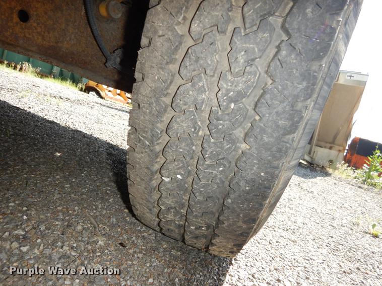 image for item DB6103 2004 Ford F250 Super Duty XLT utility bed pickup truck