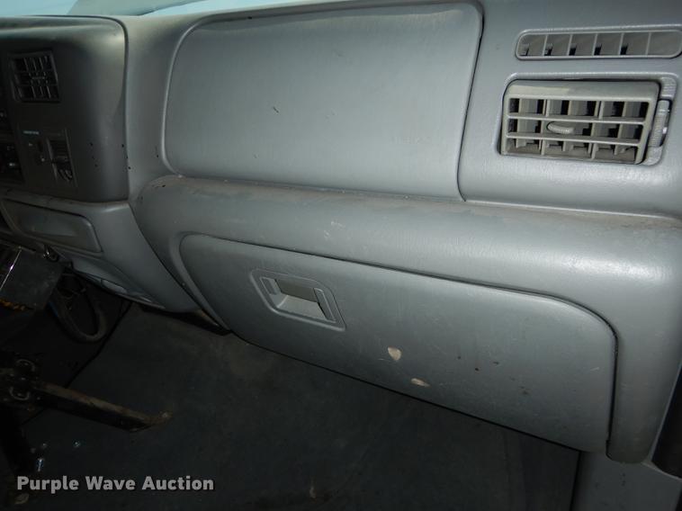 image for item DB6103 2004 Ford F250 Super Duty XLT utility bed pickup truck