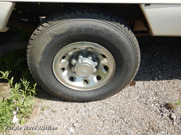 image for item DB6103 2004 Ford F250 Super Duty XLT utility bed pickup truck