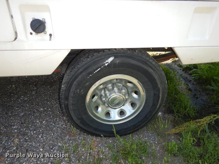 image for item DB6103 2004 Ford F250 Super Duty XLT utility bed pickup truck