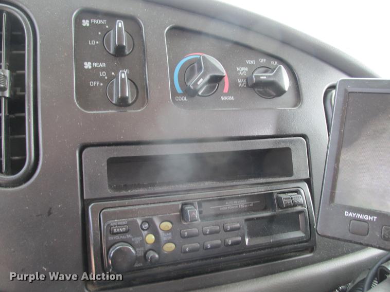 image for item DE3688 2004 Ford E350 Super Duty shuttle bus