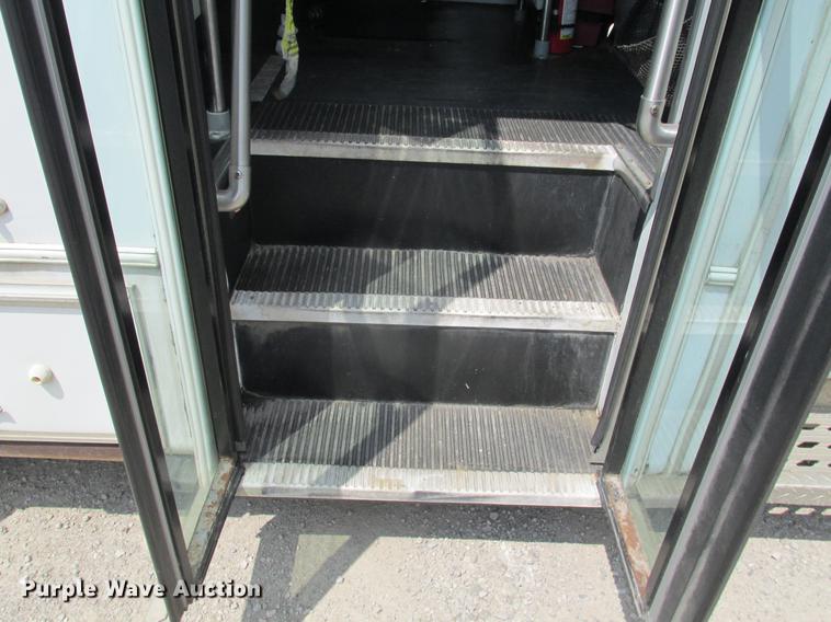 image for item DE3688 2004 Ford E350 Super Duty shuttle bus