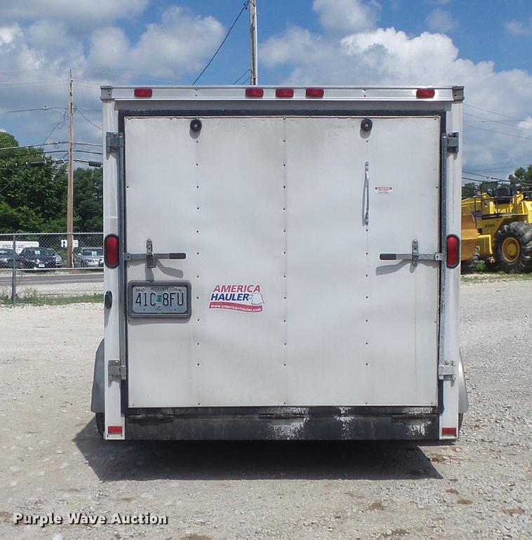 image for item DC7253 2004 Ingersoll Rand WS36 concrete saw and enclosed cargo trailer