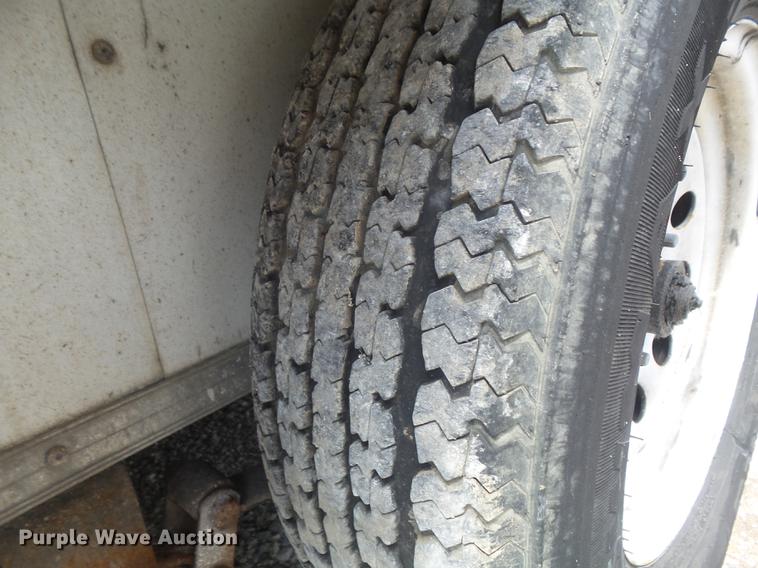 image for item DC7253 2004 Ingersoll Rand WS36 concrete saw and enclosed cargo trailer