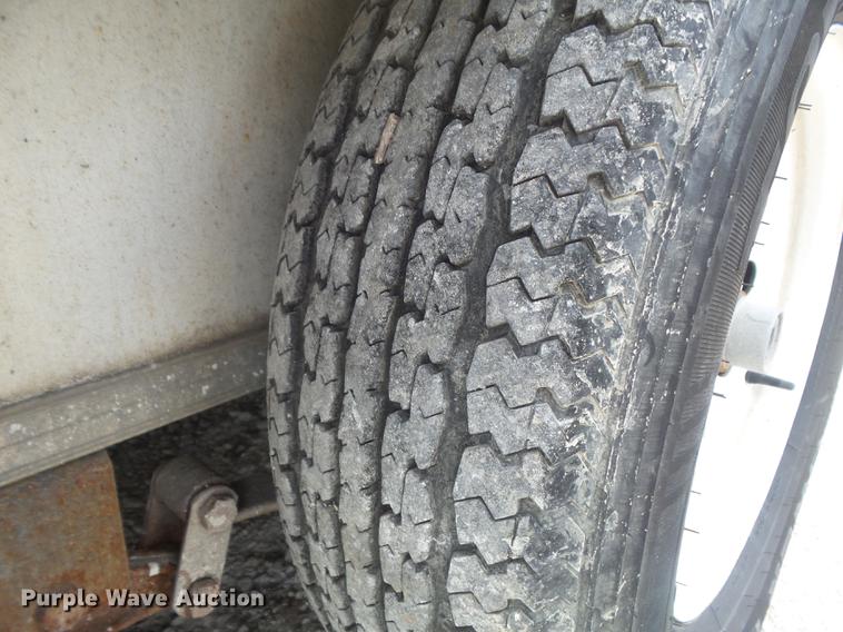 image for item DC7253 2004 Ingersoll Rand WS36 concrete saw and enclosed cargo trailer