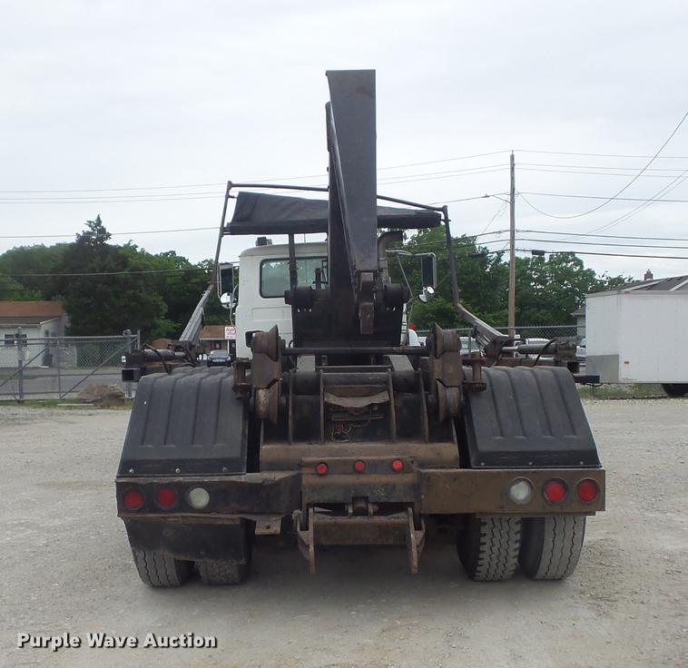 image for item DC7269 1999 Mack DM690S hooklift truck