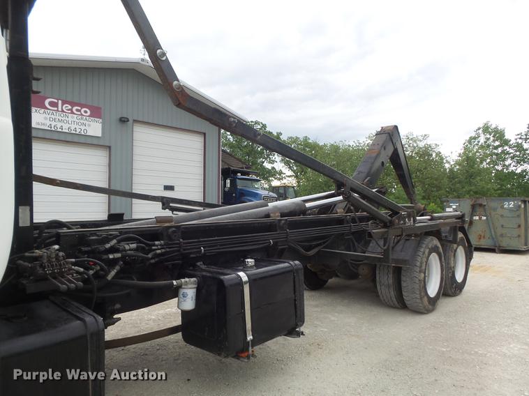 image for item DC7269 1999 Mack DM690S hooklift truck