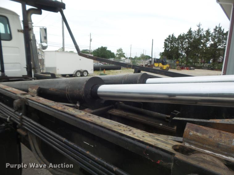 image for item DC7269 1999 Mack DM690S hooklift truck