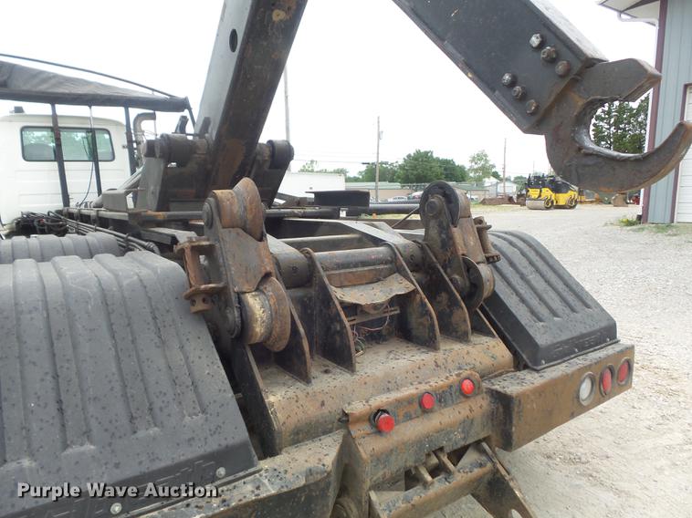 image for item DC7269 1999 Mack DM690S hooklift truck