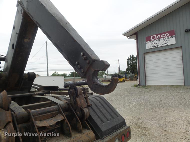 image for item DC7269 1999 Mack DM690S hooklift truck