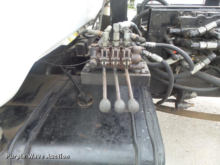 image for item DC7269 1999 Mack DM690S hooklift truck