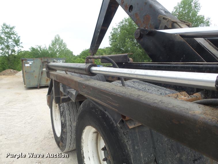 image for item DC7269 1999 Mack DM690S hooklift truck