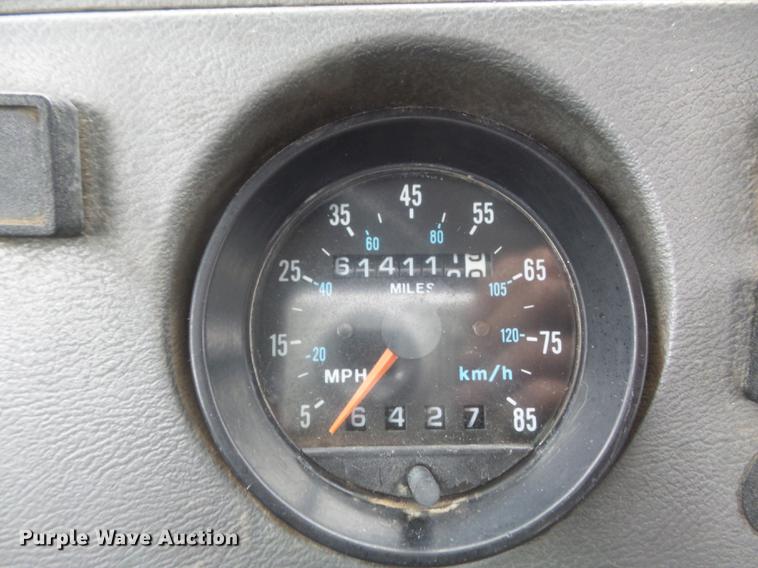 image for item DC7269 1999 Mack DM690S hooklift truck